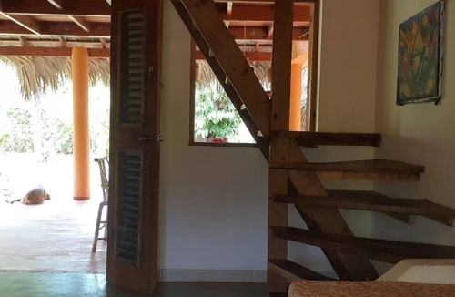 Las Galeras House | Palm-roofed house in the second row to the sea