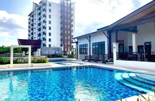 Dauis Condo | Peaceful 1-bedroom condo with access to pool, gym, and playground in Bohol