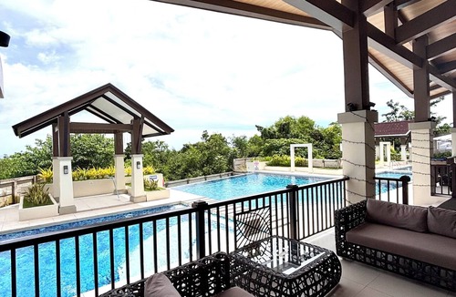 Dauis Condo | Peaceful 1-bedroom condo with access to pool, gym, and playground in Bohol