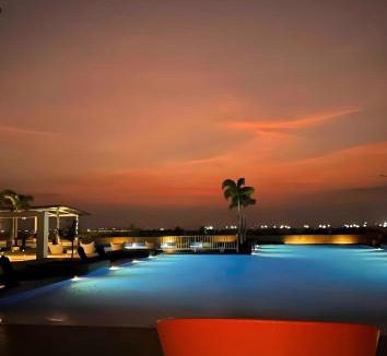 Tambo Apartment | Playful 1BR With Magnificant Bayview Garden View Near Okada Solaire Aiports with Free Parking