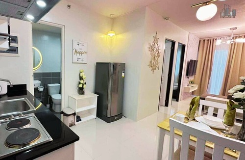 Puerto Princesa City Centre Condo | Puerto Princesa Cozy 2BR condo near Airport, FREE POOL, GYM + Parking