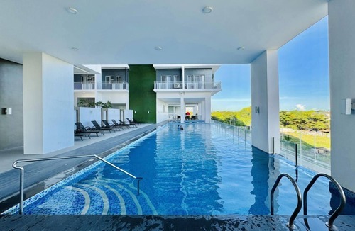 Jaro Condo | Relaxing 2-BR Condo with Pool and Playground