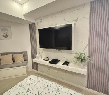 San Fernando Apartment | Rienzis Hiraya at Azure North - 11th floor studio with PS4,Washer,Mountain&Beach View