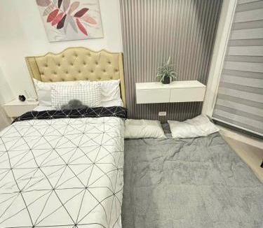 San Fernando Apartment | Rienzis Hiraya at Azure North - 11th floor studio with PS4,Washer,Mountain&Beach View