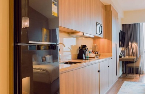 Makati Apartment | Riverfront Garden Retreat at Acqua