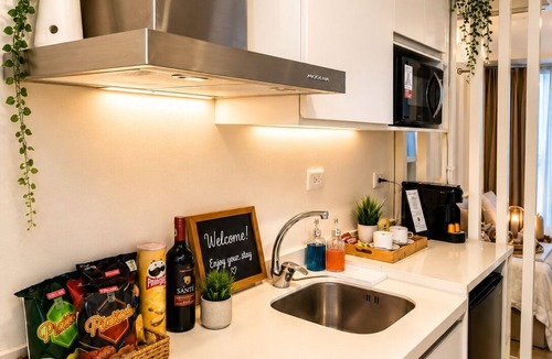 San Fernando Condo | Romantic Luxury Escape Azure North with Netflix & Wave Pool