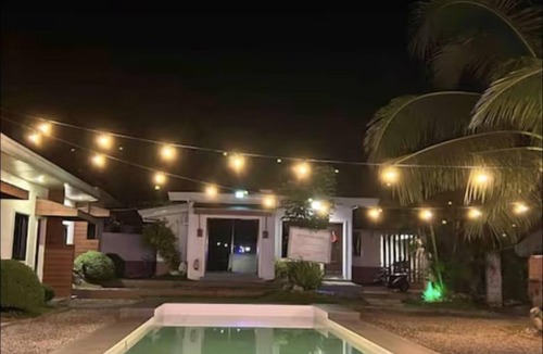 Dauis Apartment | Serene Getaway in Dauis with Pool and Shared Kitchenette