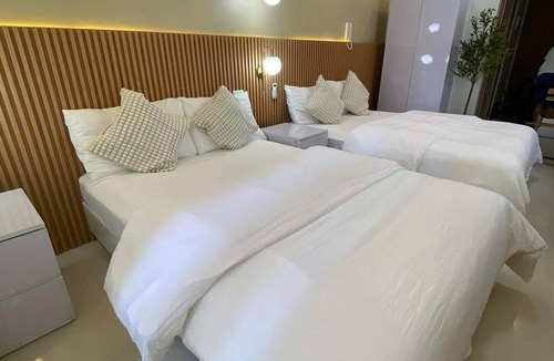 Barangay 76 Condo | Shore 3 Residences Authentic Japanese-Style Bedroom with Pool View - MOA Complex
