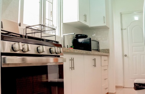 Llanos de Gurabo I Apartment | Spacious 3-bedroom apartment in charming Santiago de los Caballeros with AC