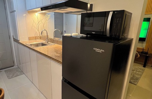 Santo Cristo Condo | Spacious 2BR Condo | Sleeps 6 | Walk to SM North EDSA | Great City Views