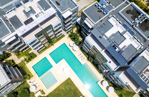 Bavaro Apartment | Spacious and Elegant 2BR Condo, King size Bed, Full AC, Pool, Steps to Hard Rock