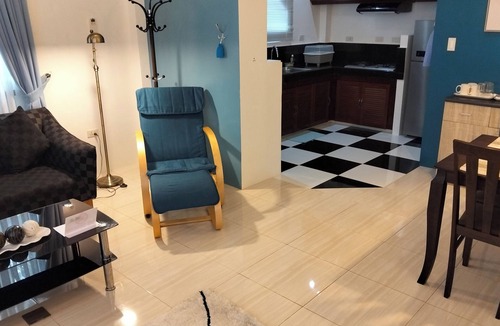 Tawala Apartment | Spacious apartment with separate toilet, sofa bed in living room.