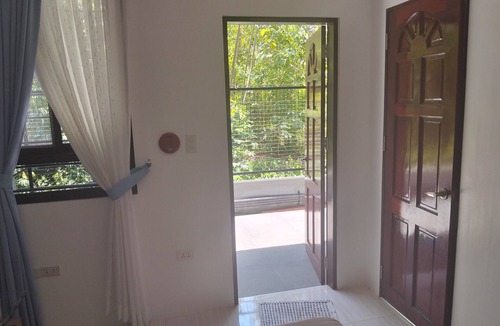 Tawala Apartment | Spacious apartment with separate toilet, sofa bed in living room.