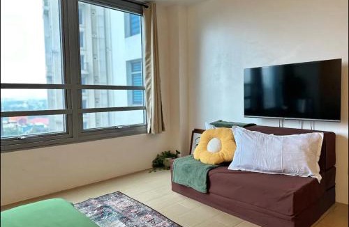 Bagumbayan Apartment | Studio in Eastwood Fast Wifi Free Pool Use