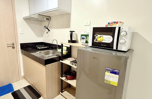 Iloilo Condo | Studio type with Balcony and Pull out bed can accommodate 4 person.