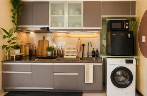 Pinagsama Apartment | Stylish Condo that fits 7 with Washer and Fast WiFi Long Stay Ready and Family Friendly Suite