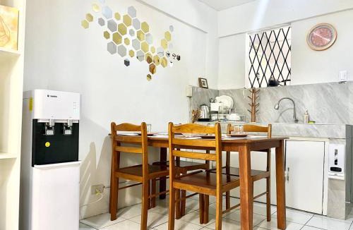 Dasmarinas Apartment | Suite Dreams Staycation - Cozy 2-BR - Wi-Fi Garden Kitchen
