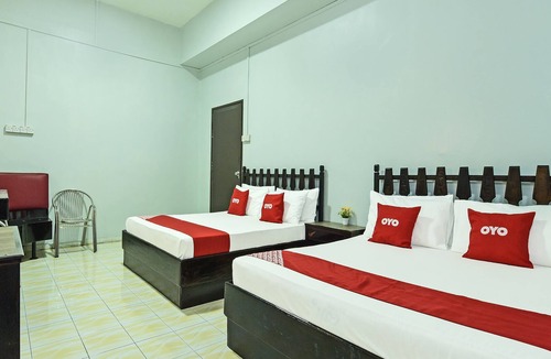 Larut Hotel | Super OYO Capital O 90659 Raintown Timbers Hotel