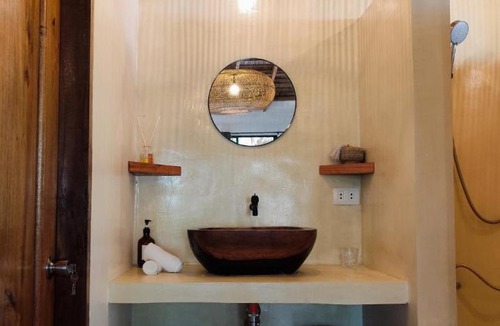 Port Barton House | Terracotta tropical nest