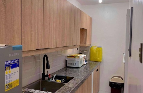Plaridel House | The GrayHouse Inn is cozy 2 bedroom furnished house-full air conditioned place.