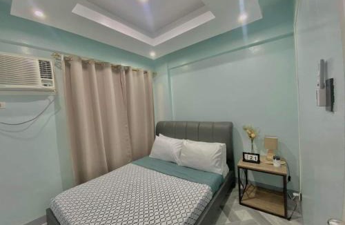 Valenzuela Apartment | The PAD Staycation 2BR Condo with PS4, Netflix, WIFI