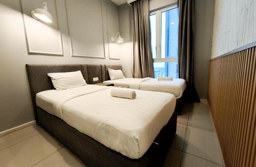 Bunga Paya Pantai Apartment | The Shore Residences by Amanjiwa