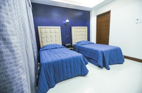 Isabel Hotel | The Suites @ Bellavista