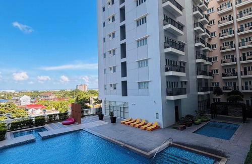 Iloilo Condo | Tranquil Poolside Balcony