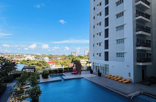 Iloilo Condo | Tranquil Poolside Balcony