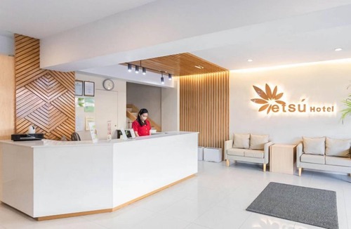 Downtown Tacloban Apartment | Tranquil Retreats: Explore the Charm of Etsu Hotel's Studio