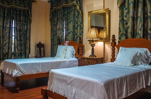 Malitbog Resort | Treasure Bay Dive Resort is set between a scenic forest view and vast calm sea.