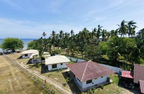 San Pedro Villa | Tropical Oasis-Private access Beachfront kubo