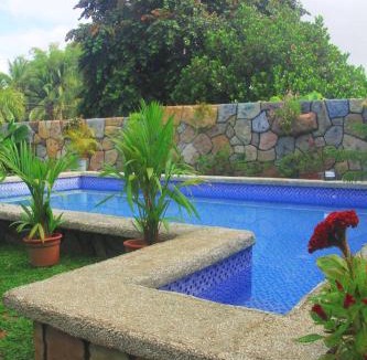 Lemery Hotel | TUBURAN Poolside