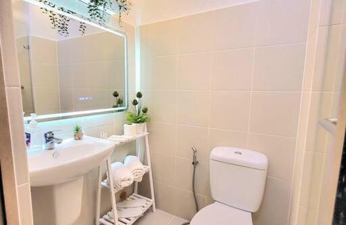 Santo Cristo Apartment | VictoriansHome at The Grass Residences with Bridgeway to SM North Edsa