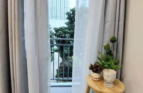 Santo Cristo Apartment | VictoriansHome at The Grass Residences with Bridgeway to SM North Edsa