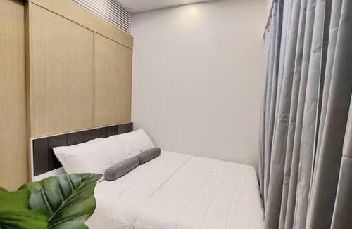 Santo Cristo Apartment | VictoriansHome at The Grass Residences with Bridgeway to SM North Edsa