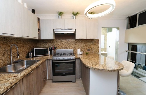 San Cristobal Apartment | Vista Hermosa RD Central Modern 2 BR Apt with Balcony and Jacuzzi.