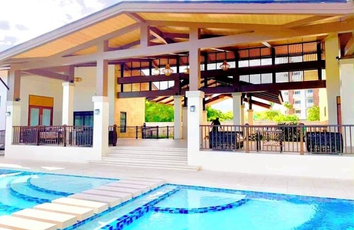 Dauis Condo | with balcony condo unit, near white beaches with pool, gym & breathtaking views