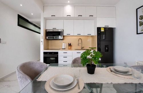 Punta Cana Apartment | Your CapCana Retreat: 2-Bedroom, Pool, Golf, and Iguanas