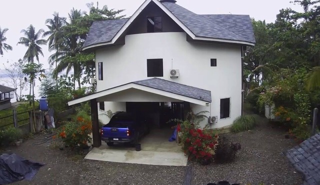 4-bdrm beach house in Tagnanan, Mabini, Philippines with a view of Samal Island in Mabini