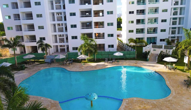 A peaceful and cozy place with an art of the state pool and near to the beach. in Playa Juan Dolio