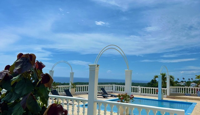 A suite with ocean view balconies, walk-in shower, pool, fire pit, & more! in Cabrera