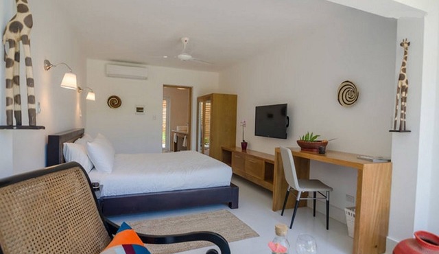 Bedroom in beachfront resort, Dominican meals available in Cabarete
