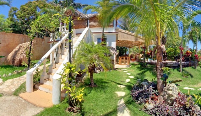 Budget room in beachfront guesthouse, steps from Playa Encuentro's surfing spot in Cabarete
