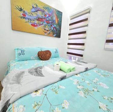 Cozy4BR Davao HomeStaycation near Mall for12 in Davao City