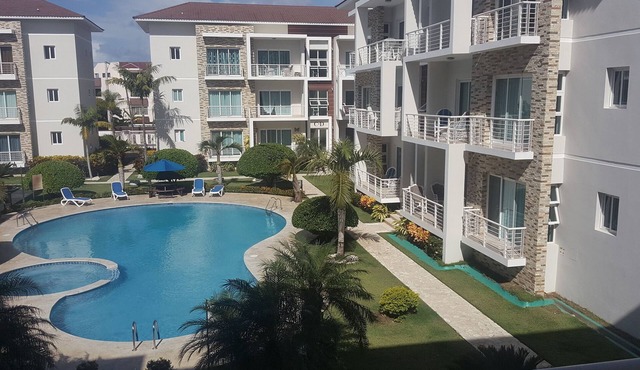 Family-friendly 3BD central Sosua condo wih large pool, WIFI, BBQ, A/C, Cable TV in Sosúa