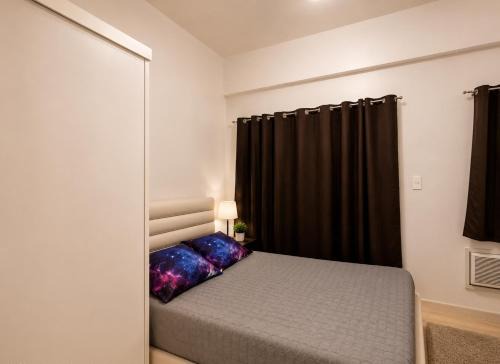 Fernly Turf at EDSA Ortigas CBD Private Condo - AMA Tower Residences WiFi, Pool & Gym