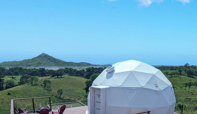 Luxurious Dome set on hillside with views to a lagoon, the ocean and mountains in Miches