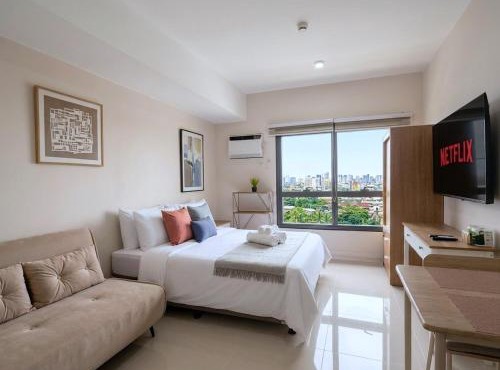 New Cozy STUDIO, walk to SM Mall, Pool, WiFi