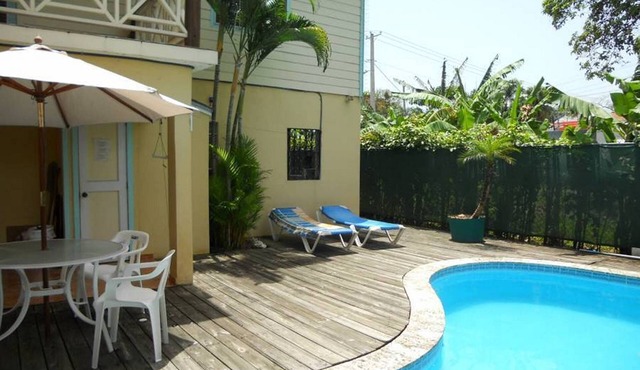 Private bedroom in guesthouse, steps from largest supermarket in Sosua in Sosúa